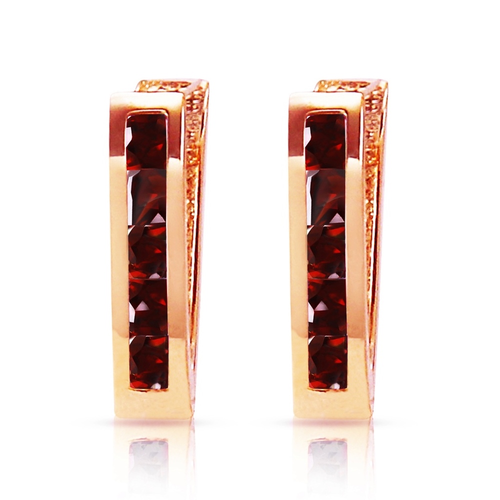 14K. SOLID GOLD OVAL HUGGIE EARRING WITH GARNETS - Picture 1 of 4